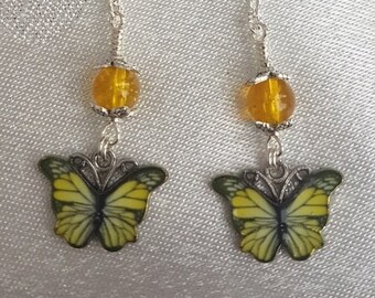 Gorgeous Dangly Yellow Butterfly Earrings - Silver Tones.