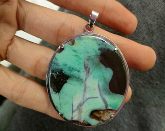 17gr(EB80) 5x4.5x0.4cm "Extreme Ovale Multicolor Natural Painting Pendant" of Crystalized and Agatized Petrified wood core Silver frame.