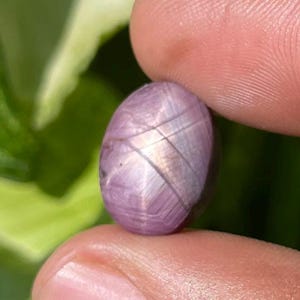 May include: A set of three ceramic mugs with a speckled, matte finish in cream, light grey, and dark grey. Each mug has a simple, minimalist design and a rounded handle.