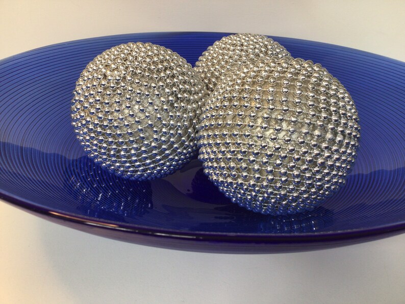 Silver beaded home decor ball in 3 sizes
Bowl or basket fillers 
Table centrepiece 
Christmas decorations