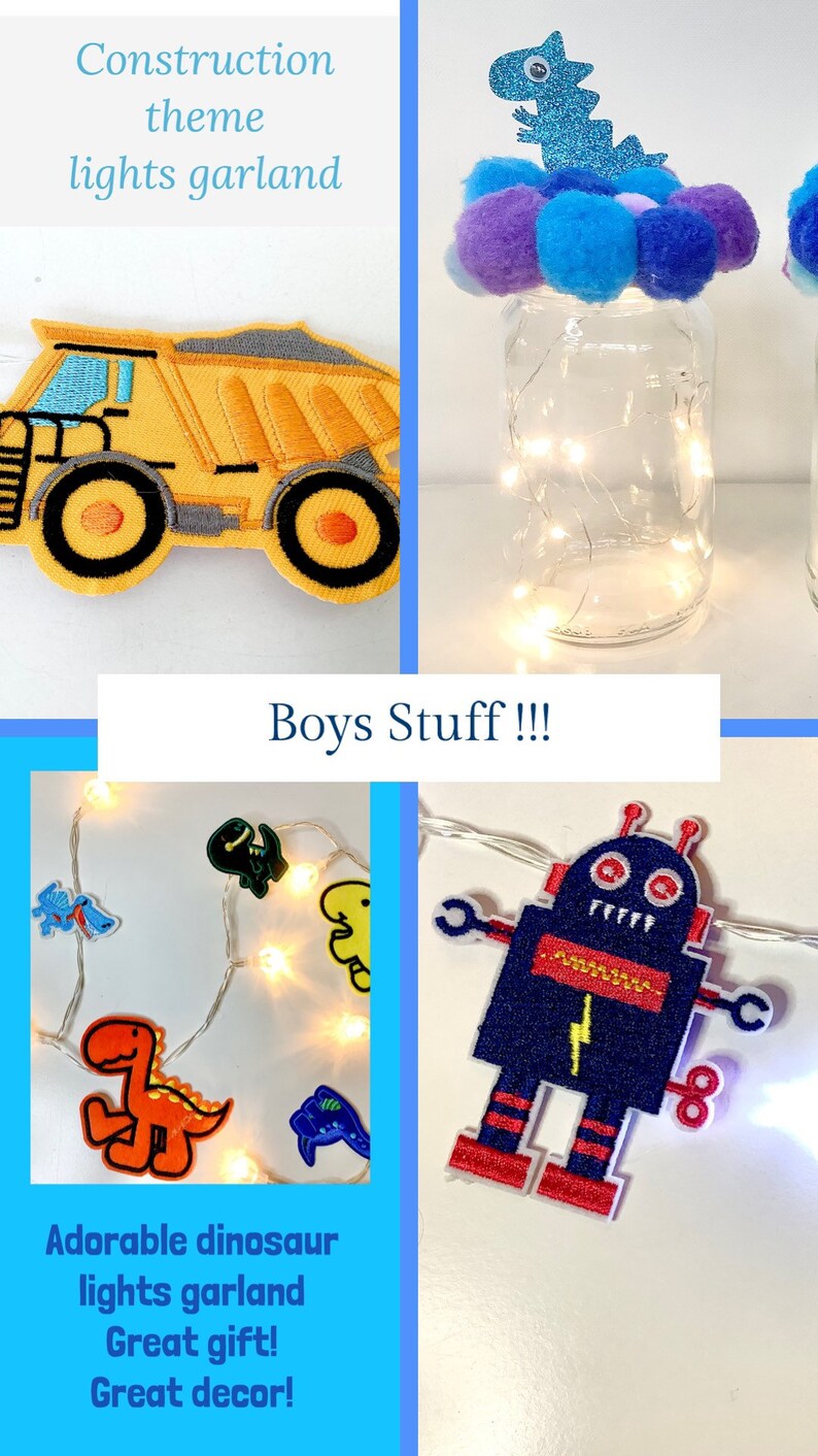 May include: A set of two glass jars with fairy lights inside. The jars are decorated with pom poms and fabric appliques. One jar has a blue dinosaur applique and the other has a yellow construction truck applique. The text "Boys Stuff!!!" is written below the jars.