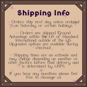 May include: A framed sign with the text "Shipping Info" in purple script. The sign provides details about order processing, shipping methods, and estimated delivery times. It also encourages customers to message with questions.