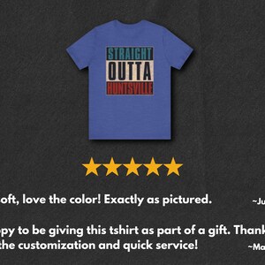 May include: A royal blue t-shirt with the text "STRAIGHT OUTTA HUNTSVILLE" in a vintage style graphic. The text is in a white, green, and red color scheme.