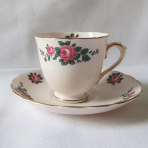 Tuscan Pink Cup and Saucer, Pink rose design, gilt edging, demi tasse, 1940s / 1950s