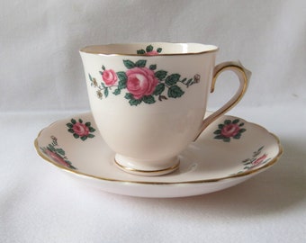 Tuscan Pink Cup and Saucer, Pink rose design, gilt edging, demi tasse, 1940s / 1950s