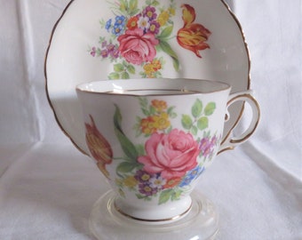 Tuscan White Cup and Saucer,  flower design, gilt trim 1950s