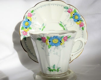 Tuscan White Cup and Saucer,  Blue Pink and Yellow Flowers, 1930s / 1940s