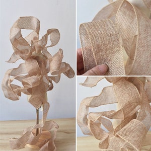 May include: A roll of natural hessian ribbon with a woven texture. The ribbon is displayed on a mannequin and in close-up shots.