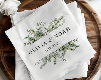 May include: White linen napkins with a green watercolor floral design and the text "Olivia & Noah 1.17.2025" printed in black.