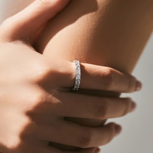 Multi-cut diamond eternity band ring in sterling silver