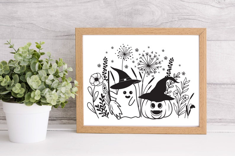 May include: Black and white illustration of a ghost wearing a witch hat and a pumpkin wearing a witch hat in a field of flowers.