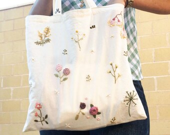 VINTAGE LINEN reimagined to a draw string kit BAG floral pretty with lovely original hand embroidery