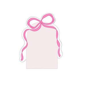 May include: A light pink tag-shaped design with a pink bow at the top and pink ribbon streamers. The tag has a white outline and is set against a white background. This design is suitable for gift tags or other craft projects.