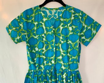 Women’s Vintage 50s/60s Dress. White with Green and Bright Blue floral. Fabric covered buttons and full skirt. Size Small.