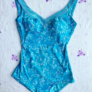 Vintage 80s Ladies Bathingsuit. Teal with Off-White & Lilac Abstract Flowers. One Piece, Size Small B Cup Swimsuit.