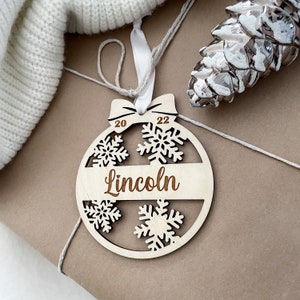 Ornement de Noël personnalisé | Ornements de noms gravés au laser | | d’ornement de boule | cadeau bébé Premier ornement de Noël de bébé