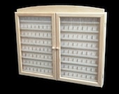 Showcase thimble collections. 2 doors. Capacity 144 thimbles. In raw pine wood. To paint.