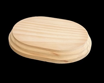 Rectangular base with rounded corners. In solid, raw pine. It can be painted. Various measures.