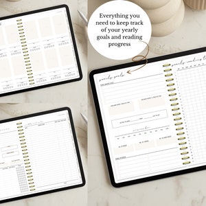 May include: A digital planner on a tablet screen with a white background. The planner includes sections for yearly goals, reading tracker, and a monthly calendar. The text "Everything you need to keep track of your yearly goals and reading progress" is displayed in a brown circle.