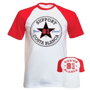 May include: White and red baseball style t-shirt with a black and white graphic of a star with the text "Support Your Local Costa Blanca 81" in a circle.