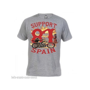 May include: Gray t-shirt with a red graphic of a motorcycle with flames and the text "SUPPORT 81 SPAIN".