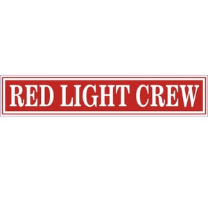 May include: Red rectangular sign with a white border and white text that reads "RED LIGHT CREW".