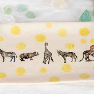 Decorative tray with hand stamped, water color underglaze animals. Wonderful baby gift, or will brighten up any place you put it.