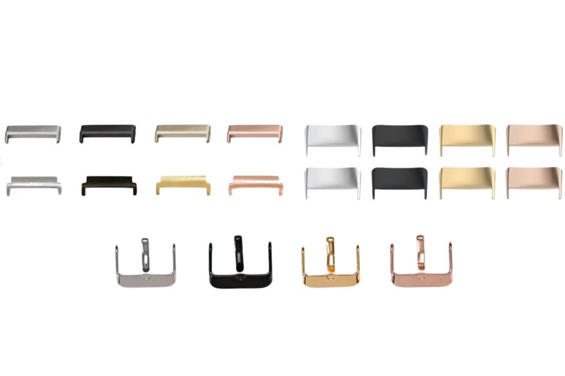 K&ouml;nnte beinhalten: Ein Satz Uhrenarmband-Schlie&szlig;en in Silber, Schwarz, Gold und Ros&eacute;gold. Die Schlie&szlig;en sind sowohl in ge&ouml;ffneter als auch in geschlossener Position dargestellt.