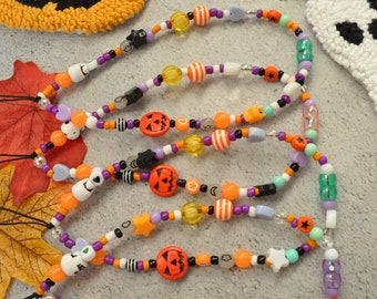 Halloween Perlen Handy Anhänger: Gruseliger Schädel leuchten im Dunkeln