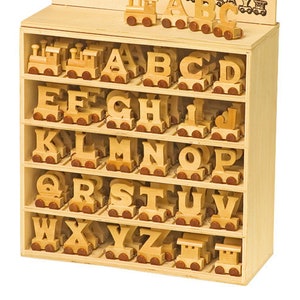 Personalised name with wooden train : Use wooden letters to spell a personalised name
