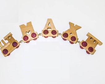 Personalised name with wooden train : Use wooden letters to spell a personalised name