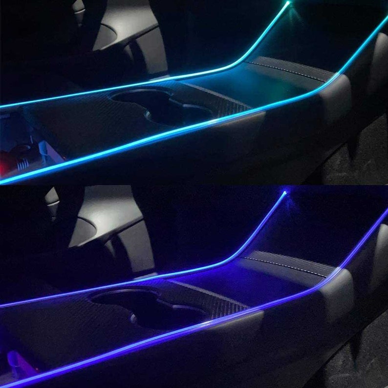 May include: Two images showing a car interior with a blue and a turquoise LED light strip installed along the center console. The light strip is visible in the center console and along the edge of the passenger seat.