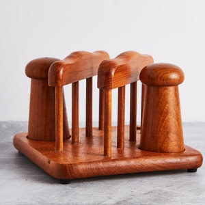 Vintage Dolphin Teak Mid Century Serviettenhalter und Salz und Pfefferstreuer Set