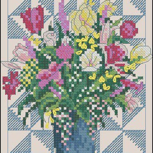May include: A cross-stitch floral arrangement in a blue vase, featuring pink, red, yellow, and white flowers with green foliage. The background is a light beige with a blue and white checkered pattern.
