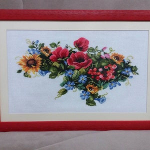 May include: A framed cross-stitch embroidery featuring a colorful bouquet of red poppies, yellow sunflowers, and blue forget-me-nots.