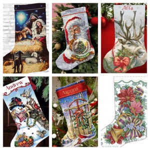 May include: A selection of Christmas stockings with diverse festive designs. One shows the Nativity, another Santa Claus with a snow globe, and others feature reindeer, snowmen, and winter landscapes. Each stocking is personalised with a name.