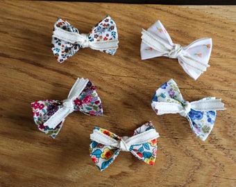 Fabric bow hair barrette