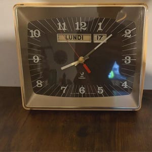 JAZ Transistor Vintage Wall Clock 1970s with Date - Elegant Retro Design