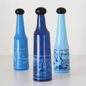 Salvador Dalì for Rosso Antico - three limited edition bottles - 1970s vintage collectible