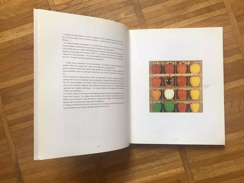 May include: A close-up of a photograph of a grid of 20 red, green, and yellow apples. The apples are arranged in a grid pattern, with each apple in its own square. The apples are all the same size and shape, and they are all arranged in a symmetrical pattern.