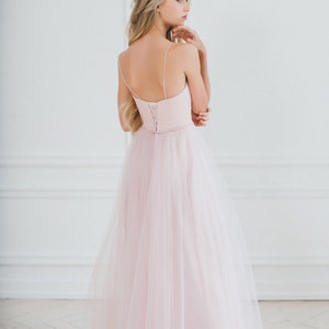 A line wedding dress, pink wedding dress, simple wedding dress, corset wedding dress, open shoulder wedding dress, spaghetti straps, a ribbon fastening on the back, a thin waistband is embroidered with crystals and pearls