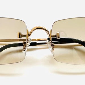 Rectangular Frameless Clear Lens ( Slightly  Tinted) Gold Frame Sunglasses. Frameless Glasses.
