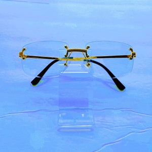 Rectangular Frameless Clear Lens  Gold Frame Sunglasses. Frameless Sunglasses.