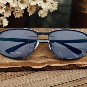 premium Quality polarized Rectangular Black Metal Frame  Black Lens Sunglasses.  Unisex  Sunglasses. Free Microfiber  Bag. Free Shipping.
