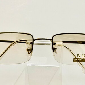 Frameless Square Small Clear Lens (Slightly  Tinted) Silver Frame Glasses. Small Square Silver Color Metal Frame Glasses .