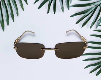 Emporio Armani Men’s Rimless Sunglasses Black and Gold Emporio Armani 210 S 881 – Vintage Frames Company main image 4