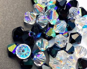 Tsjechische Preciosa Bicone-kralen: zwart en helder Aurora Borealis-kristal