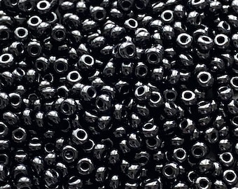 Perles de rocaille noires Preciosa : verre tchèque opaque, tailles 8 et 11