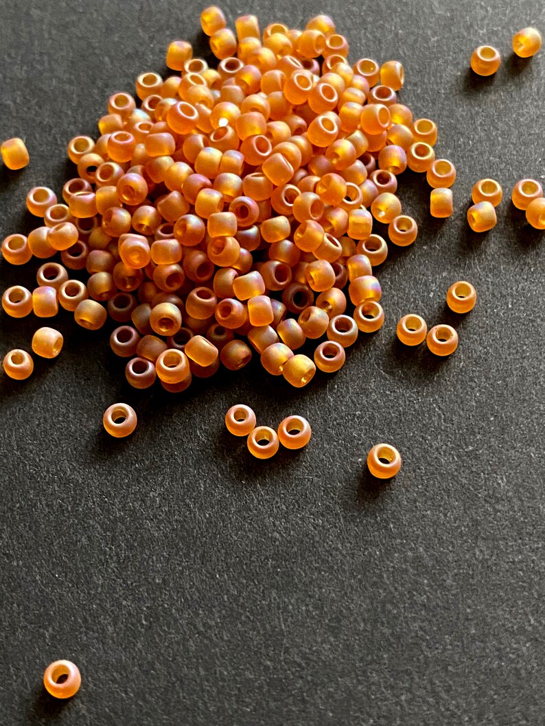 Toho #8 Matte with Rainbow Coating Seed Bead Topaz Dark