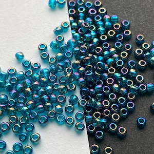 Teal #11 transparent bead with a rainbow coating, #11 Toho blue seed beads, blue rainbow glass beads, aqua blue AB seed beads